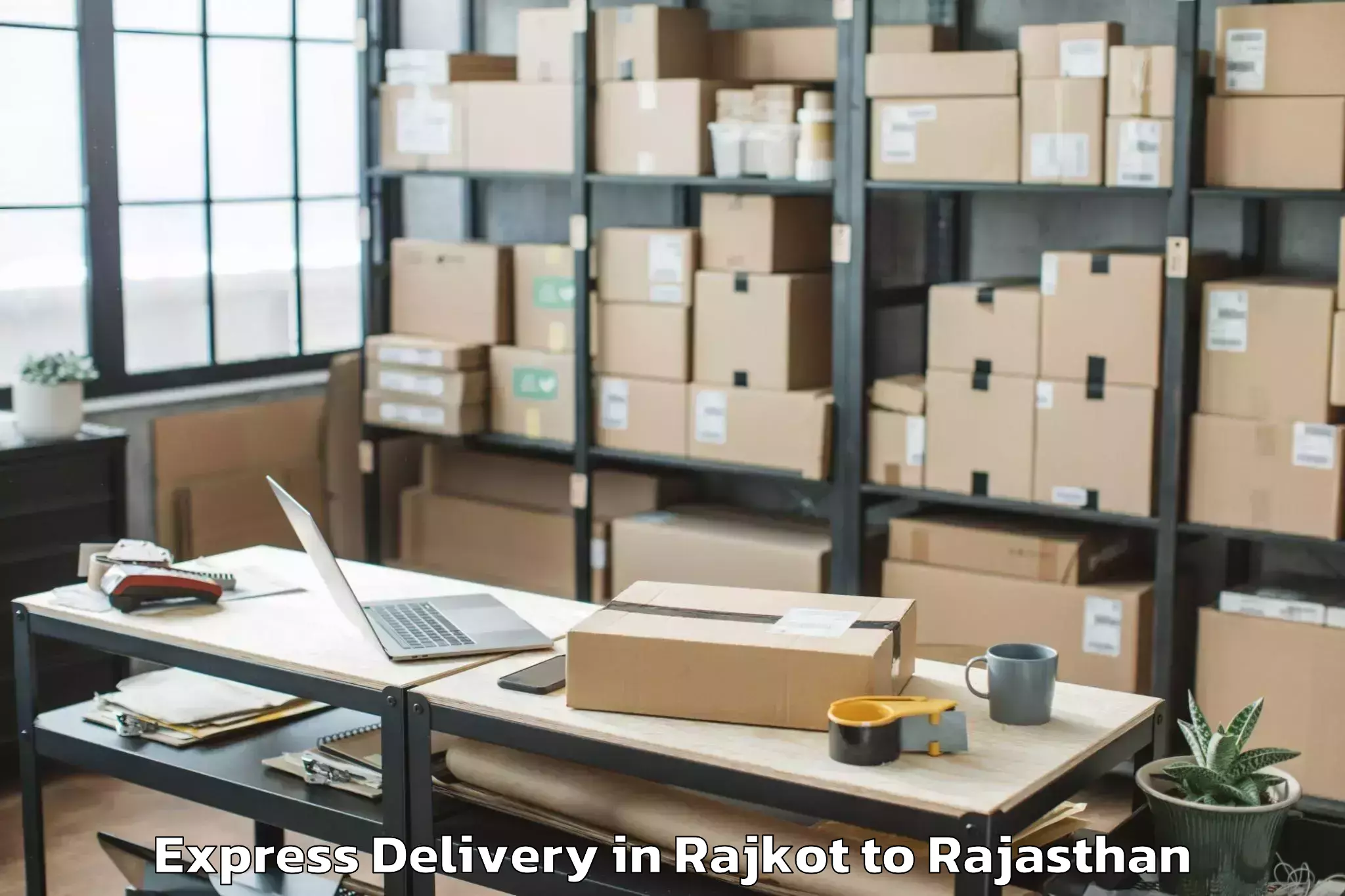 Leading Rajkot to Aklera Express Delivery Provider